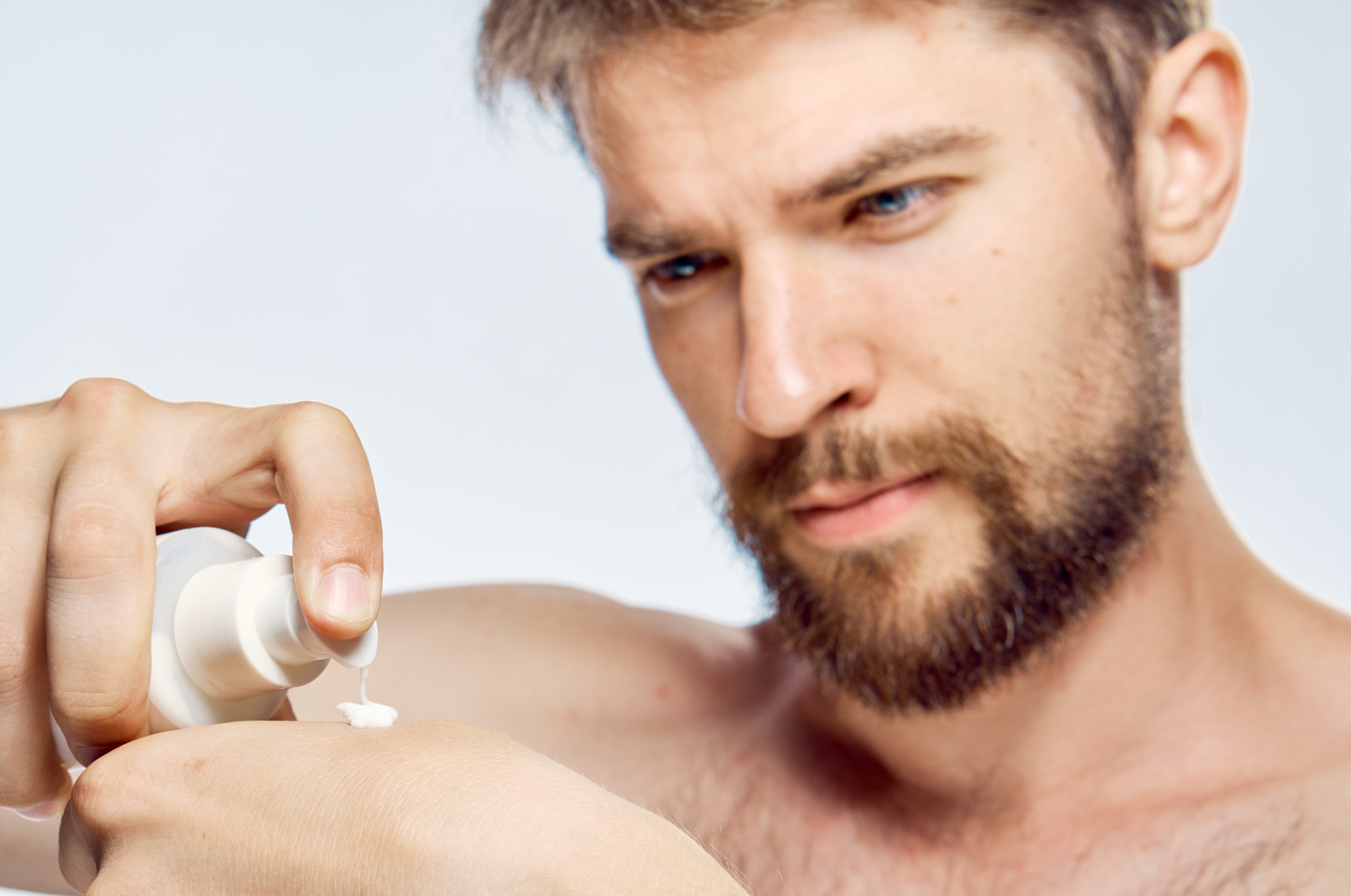 Bearded Man Face Cream Clean Skin Bare Shoulders